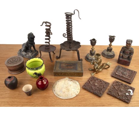 Group of miscellaneous items to include: two wrought iron cellar candlesticks, a carved wooden figures with painted decoratio