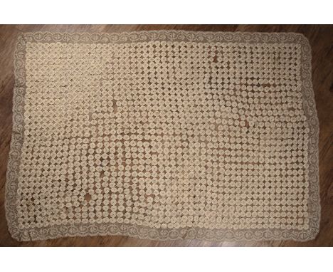 Suffolk patch and lace shawl or quilt19th Century, the central panel with conjoined patches with a decorative lace border, 14