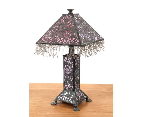 Glass lamp American, 20th Century, the shade pyramid form, the base of rectangular form on a pyramid support, with four claw 