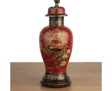 Chinoiserie lamp in the form of a shaped lidded vase, red-orange ground, handpainted with a garden scene, with gilt details t