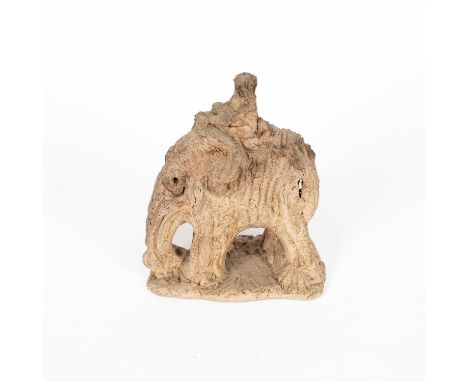 ARR Denise K Wren (1891-1979) stoneware sculpture of a figure riding an elephant, impressed marks to base, 20.5cm highOverall