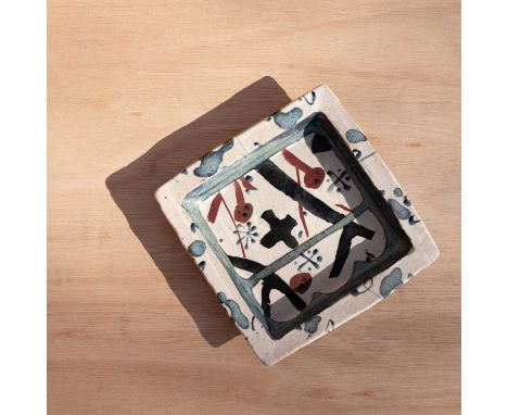 ARR John Maltby (1936-2020) a stoneware square dish decorated crosses and abstract patterns in red and blue glazes, painted s