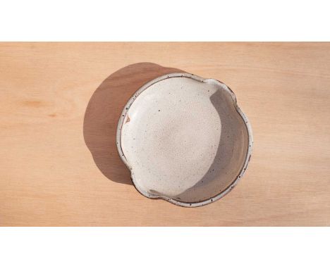 ARR Edmund De Waal (born 1964) a stoneware pouring dish in grey crackle-glaze, impressed mark to base, 24cm diameter4.5cm hig