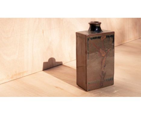 ARR Geoffrey Whiting (1919-1988) a rectangular stoneware bottle vase in tenmoku glaze decorated stylised leaf motif, 24.3cm h