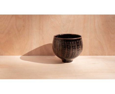 ARR David Leach (1911-2005) a deep stoneware bowl in tenmoku glaze decorated incised lines and dash design to body, impressed