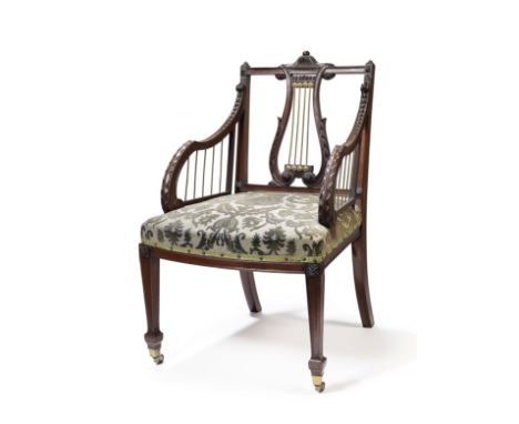 A late Victorian brass mounted mahogany open armchairpossibly by Gillows, after a design by John LinnellWith an acanthus wrap