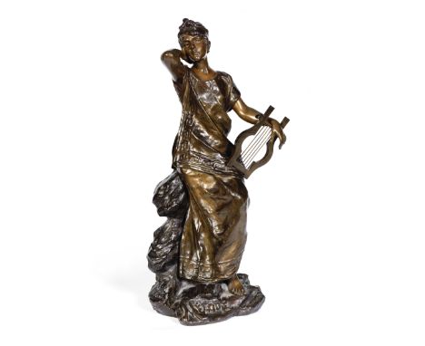 Emmanuel Villanis (French, 1858 -1914): A patinated bronze model of 'Melodie,'formed as a Greek classcial maiden holding a ly