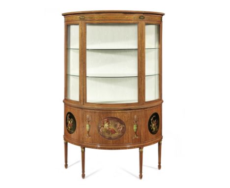 An Edwardian satinwood and polychrome decorated demi-lune display cabinetPainted with Neoclassical urns and roundels of flora