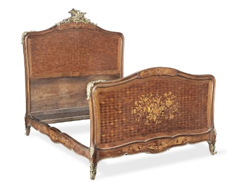 A French late 19th century gilt bronze mounted rosewood, kingwood, bois satine, amaranth marquetry and parquetry bedInlaid wi