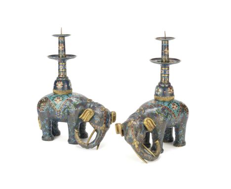 A pair of Chinese cloisonné-enamel 'elephant' pricket candlesticks19th/20th centuryEach modelled as a caparisoned elephant ca