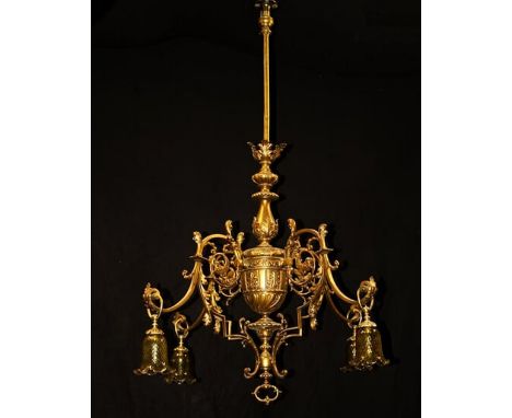 A late 19th century gilt bronze four light gasolier the four elaborate downward foliate scrolling arms with shaped angular su