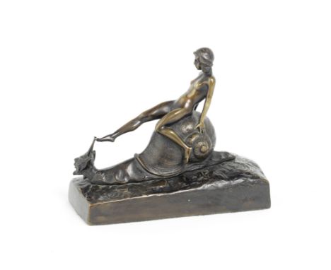 E.Wörner (German or Austrian, fl. early 20th century): A bronze study of a naked female sitting on a snailcirca 1905the figur