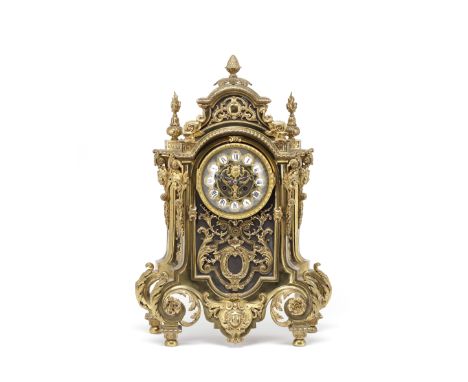 A late 19th century French gilt and patinated bronze mantle clock,in the Louis XIV style, the movement stamped Vencenti et Ci