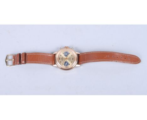 A Wakman Incabloc Chronometer wristwatch in rose gold plate and stainless steel back case with golden dial, subsidiary dials 