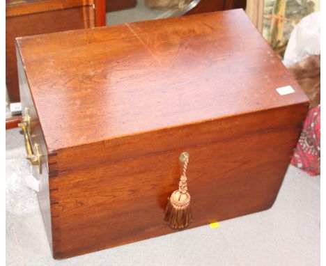 An early 20th century mahogany travelling trunk with brass carrying handles, 23 1/2" x 15" x 16"