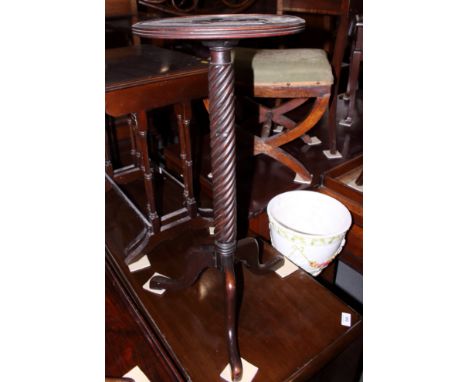 A Georgian design mahogany kettle stand, on spiral turned support and tripod splay feet, 12" dia
