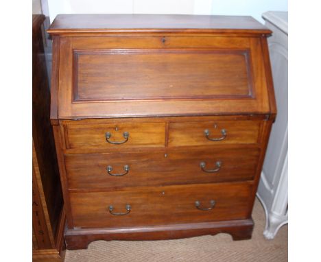 A late Victorian walnut fall front bureau with fitted interior over two short and two long drawers, on bracket feet, 36" wide