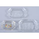 Two early 20th century French glass ash trays with etched decoration of classical scenes and another
