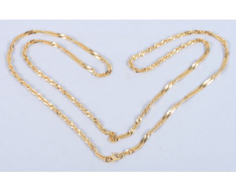 A gold twist tracelink chain, stamped 21k,18g