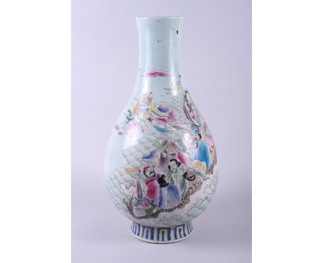 A Chinese bulbous celadon porcelain vase, decorated with figures and clouds, in polychrome enamel, 17" high