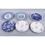 A pair of early 20th century Spode porcelain plates, painted with roses, 9" dia, and four other