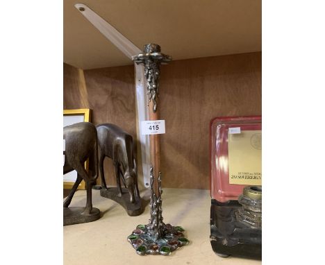 AN ARTS AND CRAFTS CANDLE STICK 