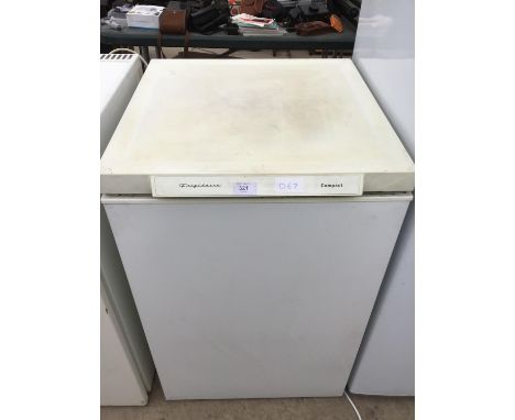 A FRIGIDAIRE COMPACT FREEZER IN NEED OF MINOR CLEAN IN WORKING ORDER 