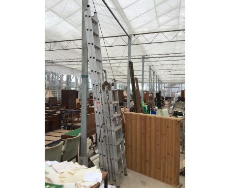 THREE SETS OF ALUMINIUM LADDERS TO INCLUDE A  TWENTY FOUR RUNG TWO SECTION, A FOURTEEN RUNG FOLDING AND A SIX RUNG STEP LADDE