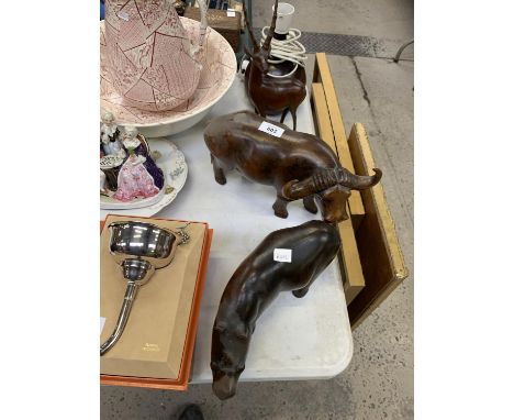 THREE WOODEN ANIMAL FIGURES TOGETHER WITH LAMP BASE 