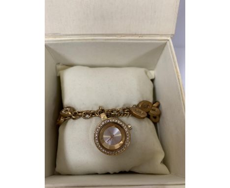 A LADIES WRIST WATCH ON YELLOW METAL CHAIN, BOXED 