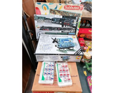 A MIXED GROUP OF ITEMS, INTERNAL COMBUSTION ENGINE, RAIL KING TRAIN SET, SUBBETEO FOOTBALL GAME AND TEAMS ETC 