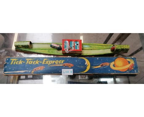 A VINTAGE BOXED TINPLATE 'TICK-TACK EXPRESS' GAME 