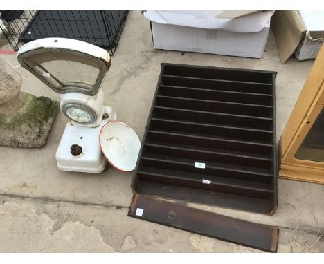 A SHELVING RACK AND A SET OF AVERY SCALES 