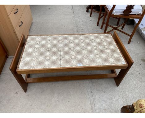 A RETRO TILE TOPPED TEAK COFFEE TABLE 