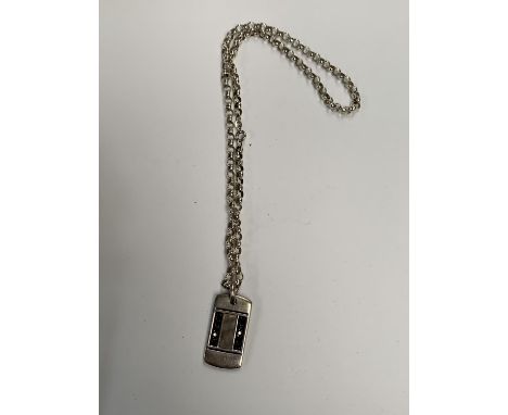 A SILVER CHAIN WITH SILVER PENDANT 