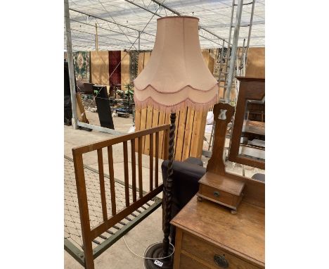 A MAHOGANY BARLEY TWIST STANDARD LAMP 