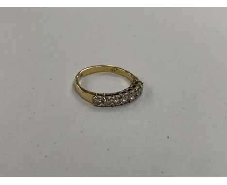 AN 18CT GOLD DIAMOND RING 