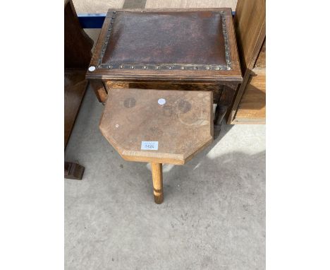 A TREE LEGGED ELM STOOL AND A SMALL OAK STOOL WITH HINGED LID AND LEATHER SEAT 