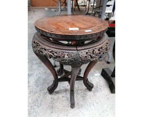 A CHINESE CARVED WOODEN JARDINIERE STAND WITH STAR OF DAVID SHELF DESIGN 