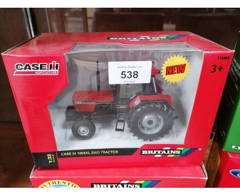 A BRITAINS BOXED DIE CAST CASE INTERNATIONAL 2WD 1056X TRACTOR MODEL, REF NO. 42793 