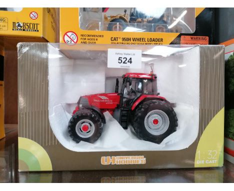 A BOXED DIE CAST UNIVERSAL HOBBIES MCCORMICK MTX 8 WHEEL TRACTOR MODEL, REF NO. 2396 