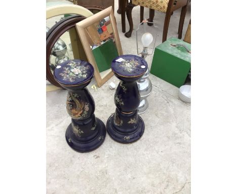 A PAIR OF ORNATE PEDESTAL STANDS AND A CHROME STYLE TABLE LAMP 