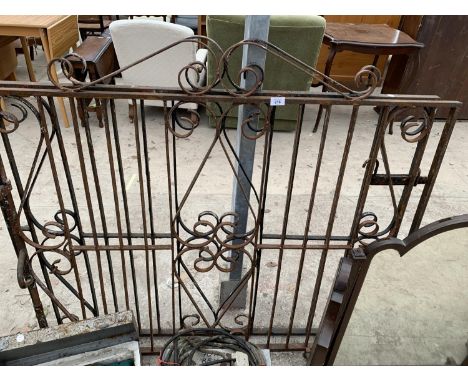 A PAIR OF ORNATE WROUGHT IRON GATES EACH GATE 128CM X 112CM TO HIGHEST POINT 