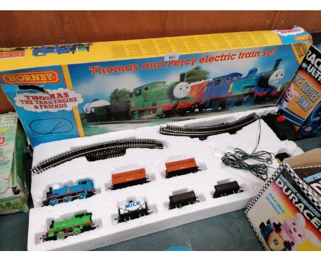 A BOXED HORNBY THOMAS THE TANK ENGINE AND PERCY ELECTRIC TRAIN SET 