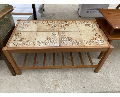 A RETRO TILE TOPPED TEAK COFFEE TABLE 