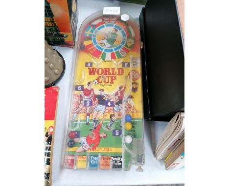 A VINTAGE WORLD CUP FOOTBALL PORTABLE PIN BALL GAME 