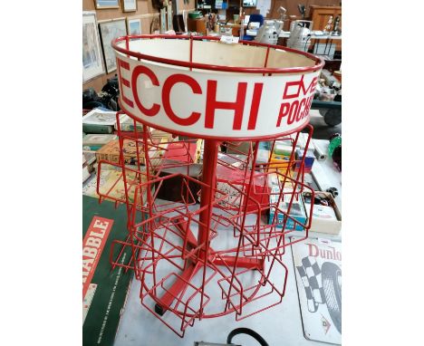 A VINTAGE RED TUBULAR METAL DISPLAY STAND 