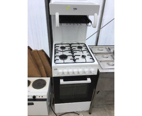 A BEKO GAS COOKER WITH UPPER GRILL, FOUR RING HOB AND OVEN IN WORKING ORDER 