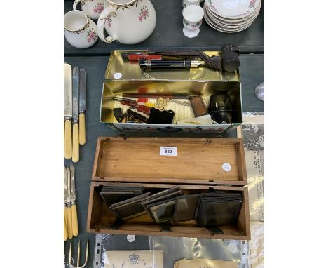 TWO BOXES CONTAINING ASSORTED PICTURES, CANDLE STICK AND VARIOUS TOOLS 