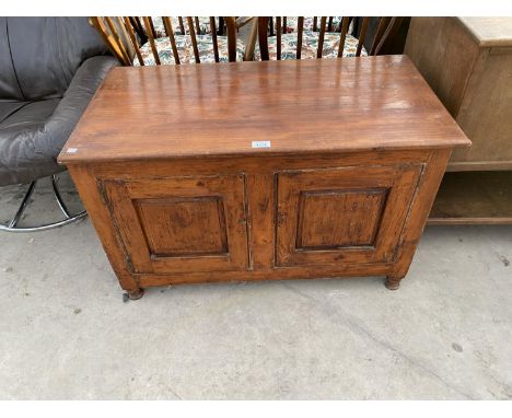 A PINE BEDDING CHEST WITH HINGED TOP AND A MAHOGANY LINEN CHEST WITH HINGED TOP AND LOWER SHELF 